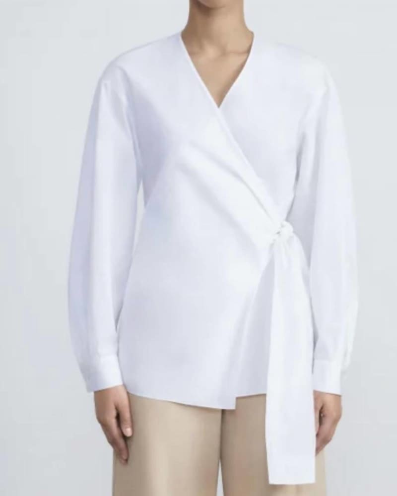 Front of a model wearing a size L Wrap Top in White in White by Lafayette 148. | dia_product_style_image_id:341430